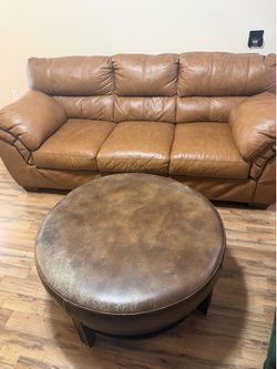 Ashley Furniture Whitlock caramel 3-cushion sofa features plush, pillowy arms and back cushions.