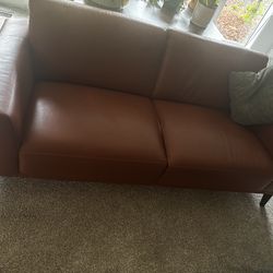 Leather love seat