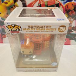 Harry Potter - Fred Weasley with Weasleys' Wizard Wheezes Funko Pop! Deluxe 