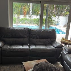 Two Oversized Leather Recliner Love Seats