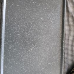 Grilled steak or pancakes or egg kind flip side