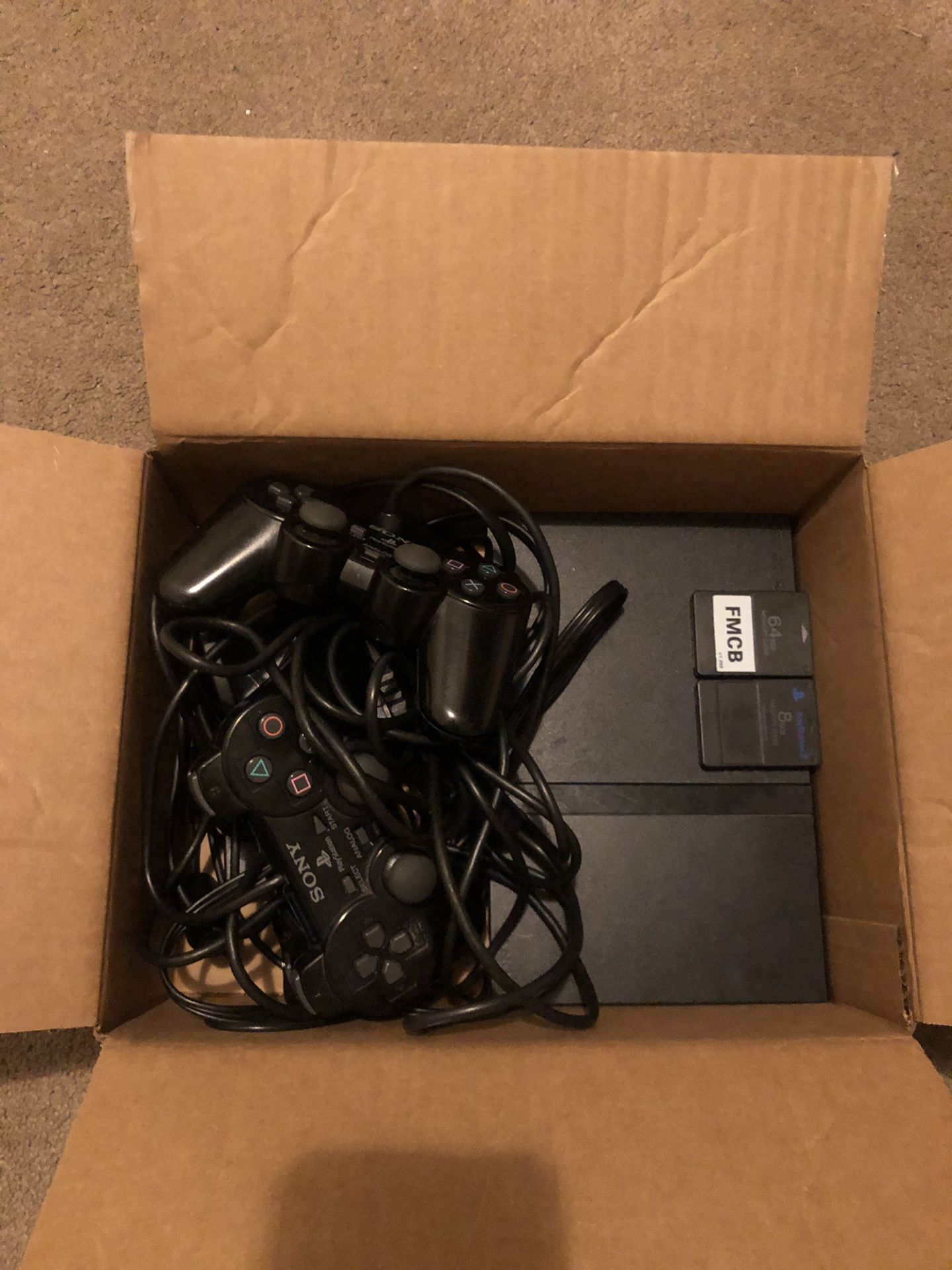 Playstation 2 (Comes With 2 Controllers And 2 Memory Cards)