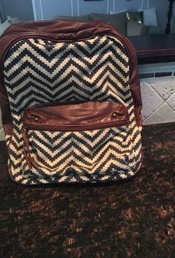 Medium size brown backpack.