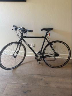 Surly Cross x Check (Natch 4130 Double Butted Chrome-moly), color is black