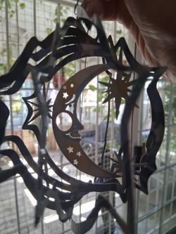 Sun and moon wind spinner-new in box.