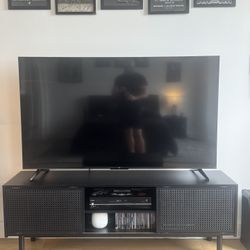65” Like New TCL Smart TV And Entertainment Center
