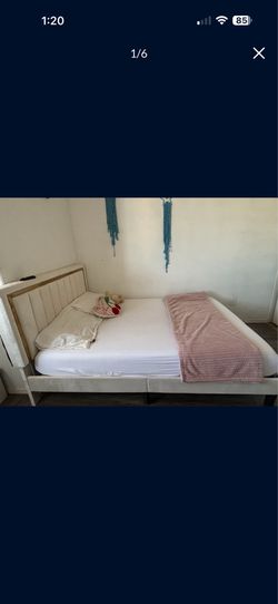 Full size beige and gold bed frame
