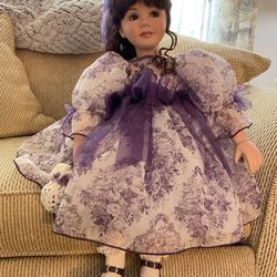 Marie Osmond beautiful porcelain doll  with certificate of authenticity