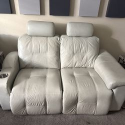 Genuine leather powered reclining loveseat