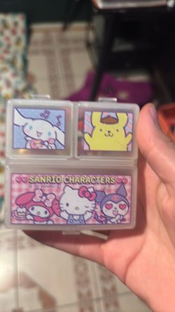 Little pill holder comes w angel charm and hello kitty charm for crocs