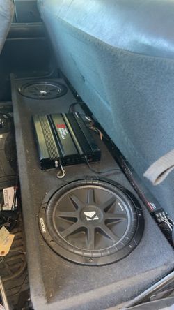 Two 12 inch kicker subs with box and amp