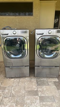 Front load LG washer and dryer metallic silver