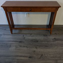 Table  45 1/4"X 13" with draw.