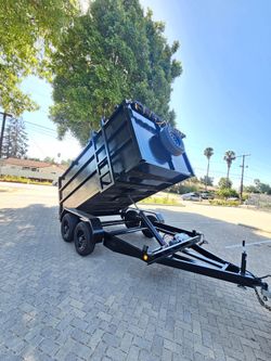 BRAND NEW DESIGN DUMP TRAILER 12x8x4 12,000 LBS ROLLING TARP AND SPARE TIRE HYDRAULIC SYSTEM ELECTRIC BRAKES TITLE IN HAND FOR ANY QUESTION TEXT ME PL
