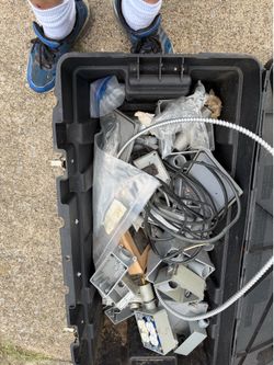 An electricians box with so many assorted fittings, etc.