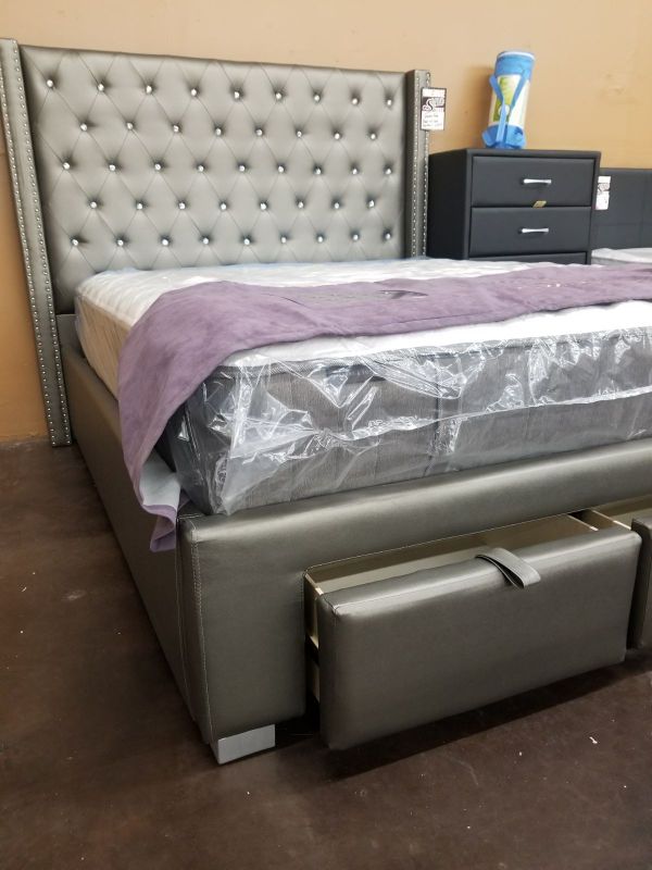 Contemporary grey leather diamond tufted queen platform bed with a