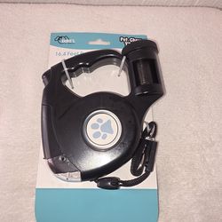 New in Box Rectratable Dogs leash with Waste Bag Dispenser 16'Black Color