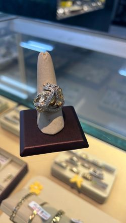 Gold and diamond horse ring