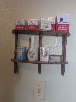 Vintage spice rack with spice tins