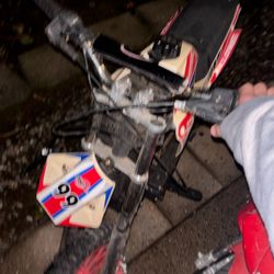 Miniature dirtbike for seven and eight-year-old boys and girls