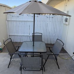 Outdoor Patio Dining Set – Table, 4 Chairs & Umbrella (Like New)