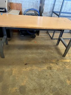 Uline table 72x30” with adjustable height.