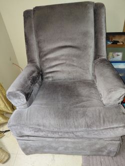 Pair of purple straight back swivel chairs/sofa
