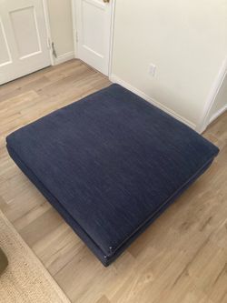 West Elm Harmony Ottoman 47x47” oversized walnut legs