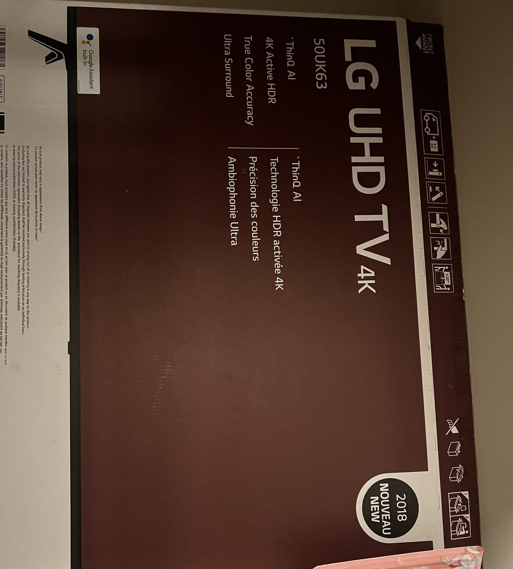 LG TV UHD 50 inch and black tv console table