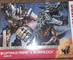 2014 Transformers 4 Age Of Extinction Voyager Class Optimus Prime and Grimlock Set