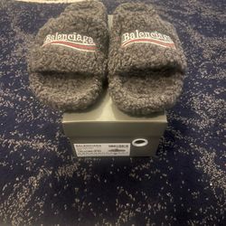grey Balenciaga fur slides