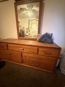 Dresser with a mirror