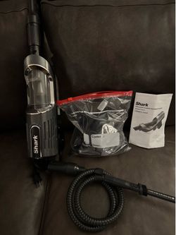 Shark ultra light weight corded vacuum with attachments extra hose no bags needed clean amazing suction asking 50 still like new great for deep cleani