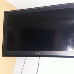 Sony TV,  King Size Bed Wood Frame