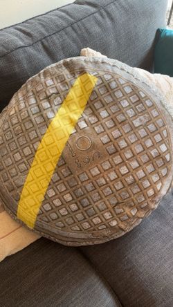 Manhole cover pillow