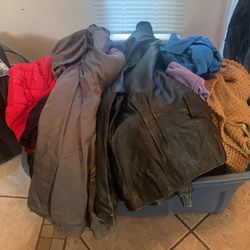A tub filled with jackets medium and large