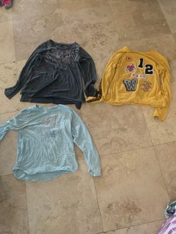 Girls long sleeved shirts size 10-12