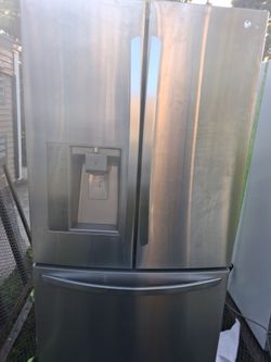 LG REFRIGERATOR 3 DOOR STAINLESS  WORKS GREAT