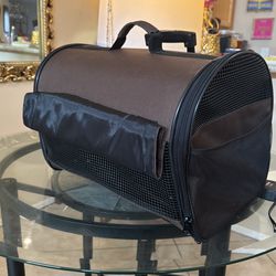 Large Sturdy Pet Carrier With Rolling Wheels. Dimensions are 18 1/2 inches long 1 foot wide and 1 foot tall. Nice additional feature is at the top of 