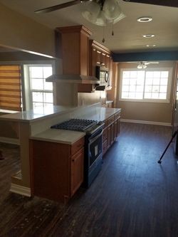 Kitchen cabinets an counters my price can't be beat. Complete kitchen upgrades. Computer design new open layout.