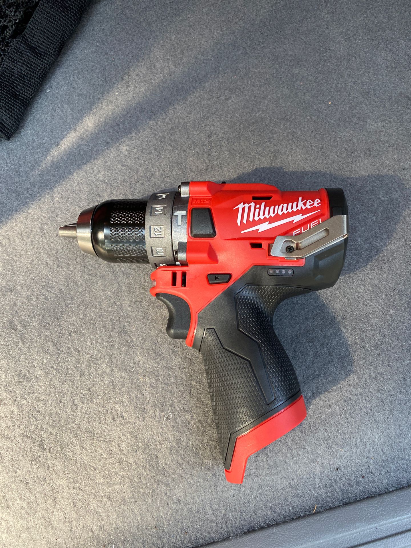 Milwaukee M12 Fuel 1/2” Hammer Drill/Driver, M12 1.5 and 2.0 AH Batteries, and M12 Chargers