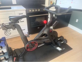 Peloton Bike + with mat and 2 pairs of shoes