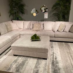Rawcliffe Parchment 3-Piece Sectional With Ottoman
Ashley Furniture$10 Down Payment And Financing Available