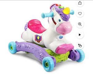 V tech rock and learn ride on toy