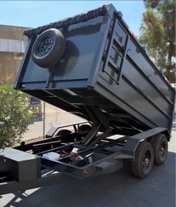 Scissor lift dump trailer