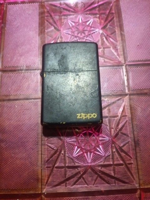 Vintage Black Colored Used Zippo Lighter Made In The USA FOR SALE 