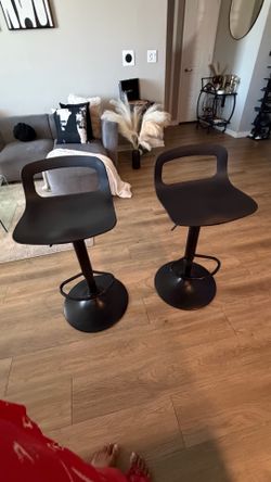 Black adjustable bar stools