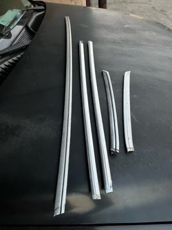 Cutlass back window molding