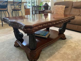 Beautiful formal coffee table and end table.