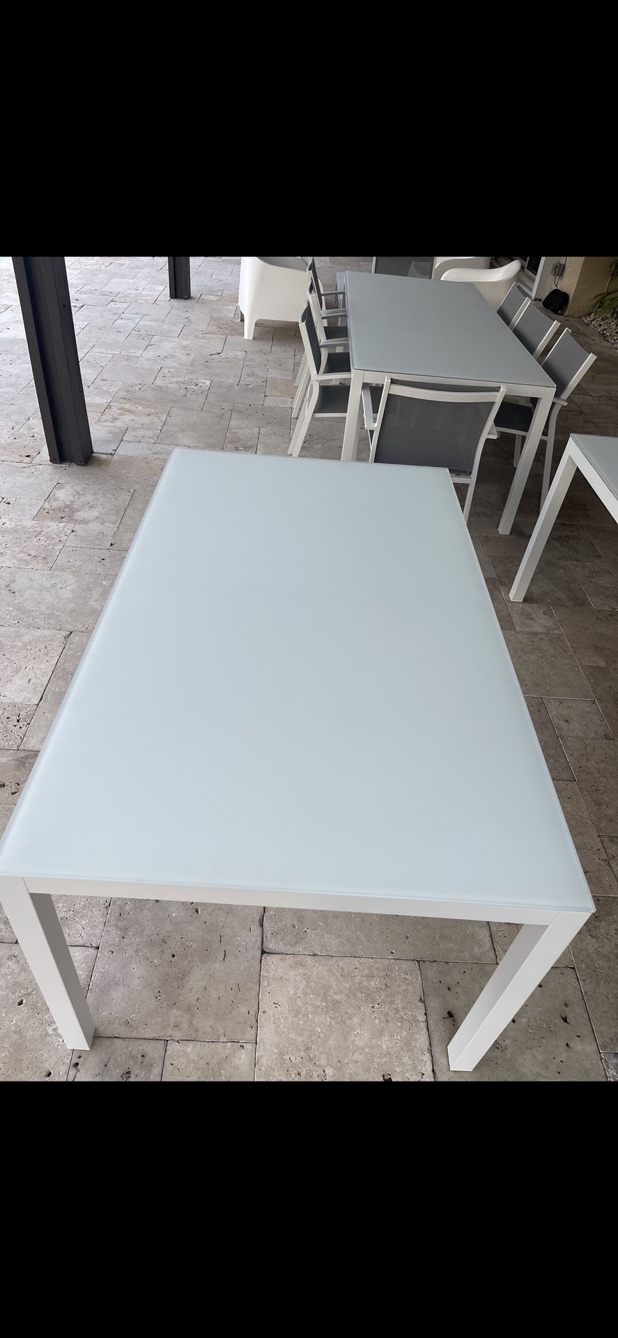 New!!! Modern outdoor aluminum rectangular table with tempered glass, 86”. Never used.